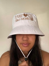 Load image into Gallery viewer, Unisex: Unf*ck The World Bucket Hat in White w gold
